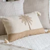 Coussin pompons palmier 50x30cm