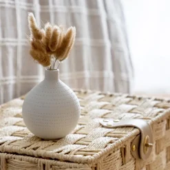 Queues de lapin dans vase boule
