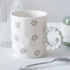Tasse creme motif fleurs & perle
